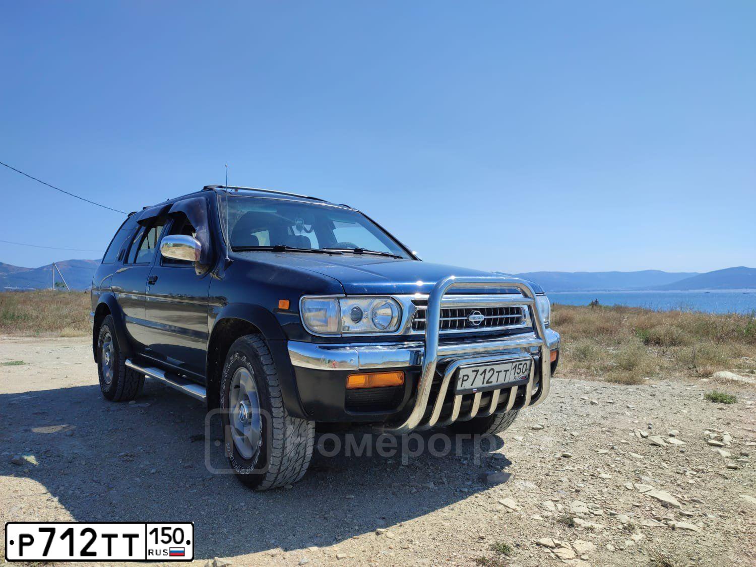Фото автомобиля NISSAN PATHFINDER, 1998 — госномер Р712ТТ150. Цвет: СИНИЙ ТЕМНЫЙ