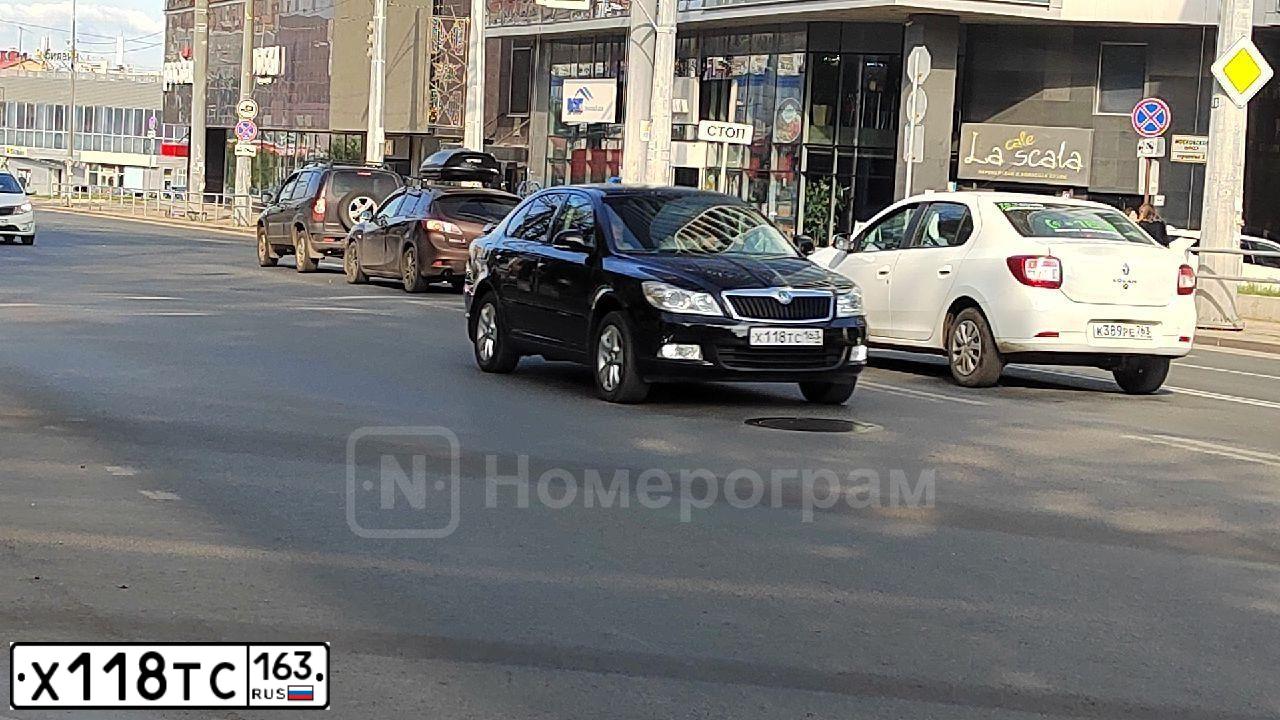 Фото автомобиля SKODA OCTAVIA, 2013 — госномер Х118ТС163. Цвет: ЧЕРНЫЙ