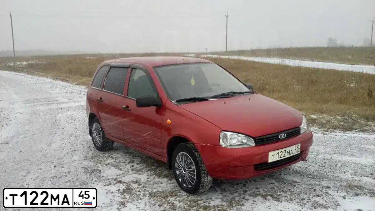 Фото автомобиля LADA 1117 KALINA, 2011 — госномер М900УР86. Цвет: СЕРЕБРИСТО-КРАСНЫЙ