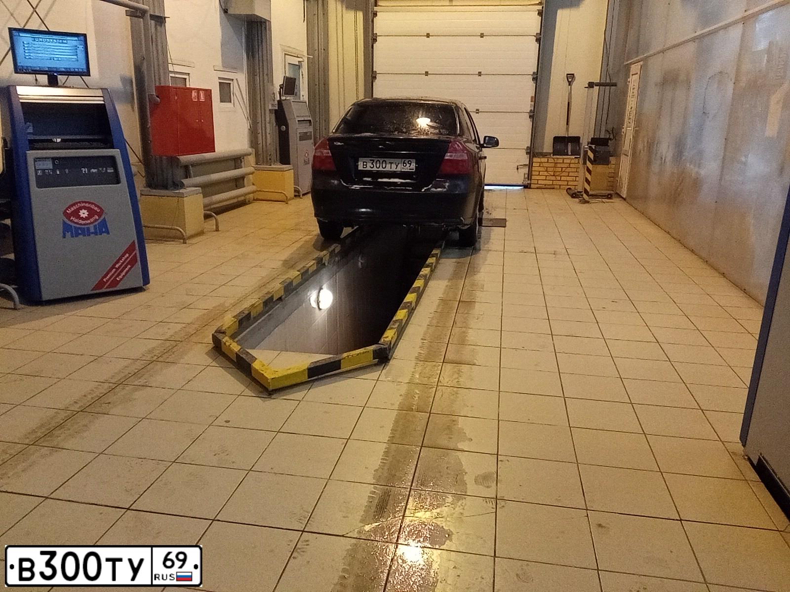 Фото автомобиля CHEVROLET AVEO, 2006 — госномер О017ВС32. Цвет: ЧЕРНЫЙ