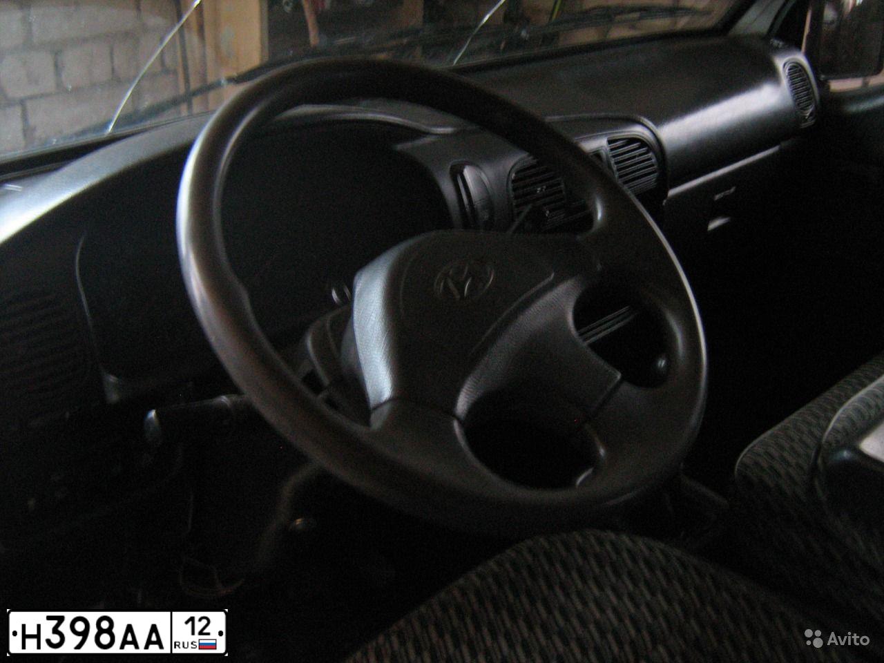 Фото автомобиля HYUNDAI GRACE, 1996 — госномер Н398АА12. Цвет: БАКЛАЖАН