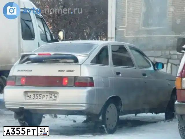 Фото автомобиля LADA 2112, 2006 — госномер А355РТ21. Цвет: СЕРЕБРИСТЫЙ