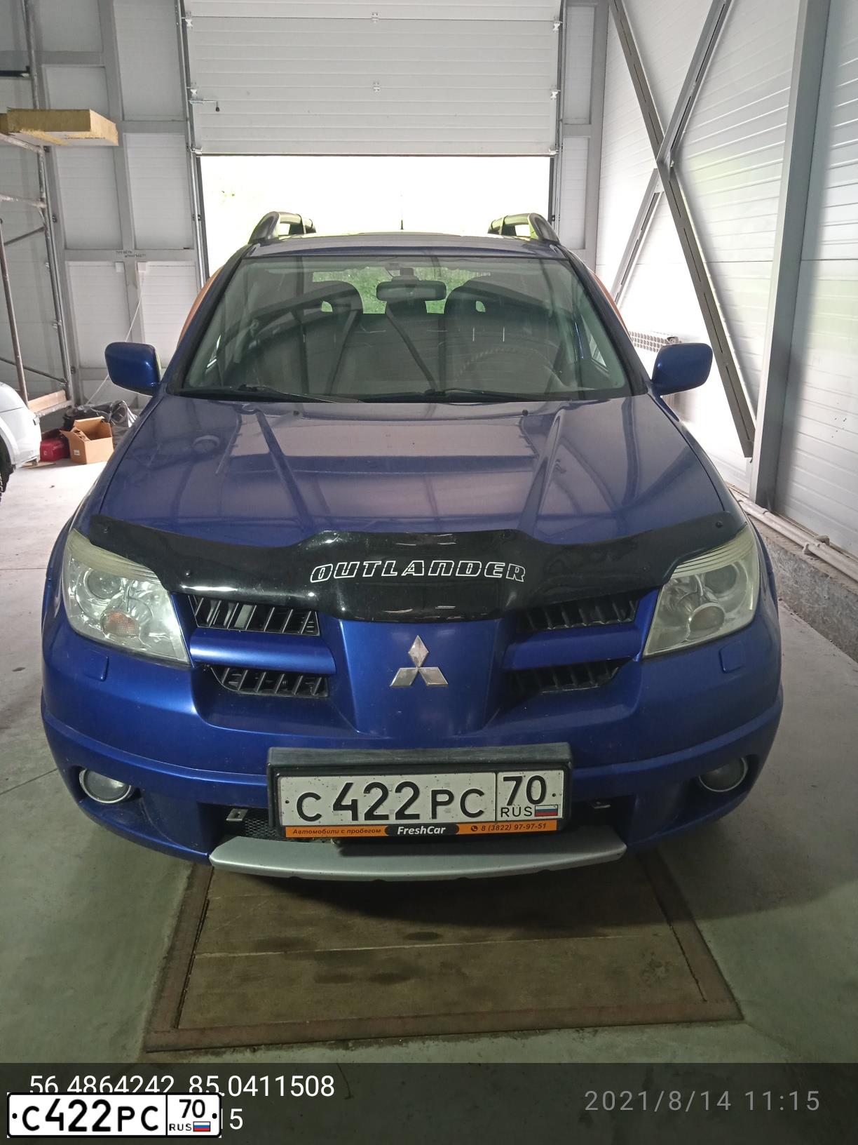 Фото автомобиля MITSUBISHI OUTLANDER, 2007 — госномер С422РС70. Цвет: синий