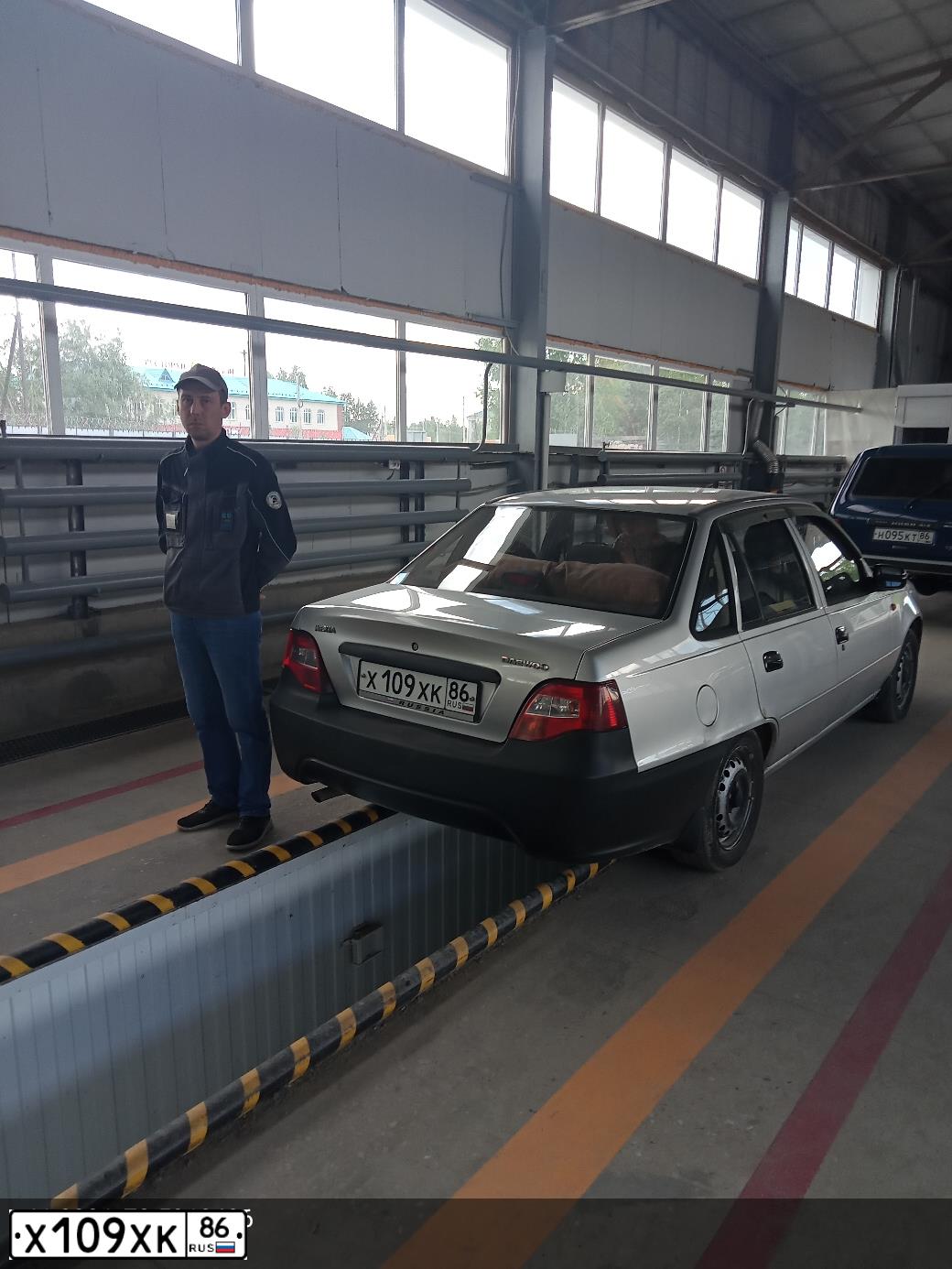 Фото автомобиля DAEWOO NEXIA, 2010 — госномер Р832МА70