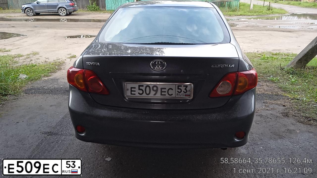 Фото автомобиля TOYOTA COROLLA, 2007 — госномер Н058АМ35. Цвет: СЕРЫЙ МЕТАЛЛИК