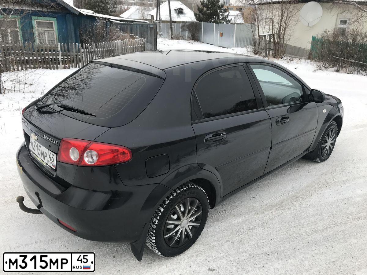 Фото автомобиля CHEVROLET LACETTI, 2008 — госномер Н214ОЕ196. Цвет: ЧЕРНЫЙ