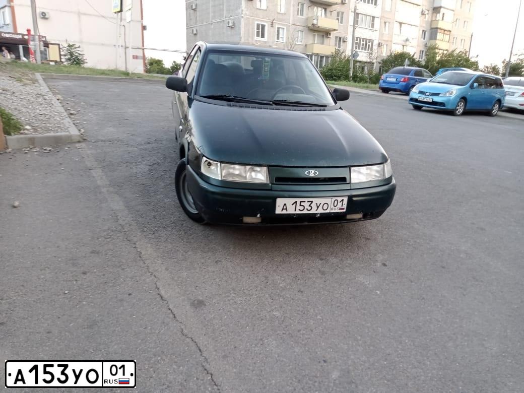 Фото автомобиля LADA 2110, 2002 — госномер А153УО01. Цвет: Темно-зеленый