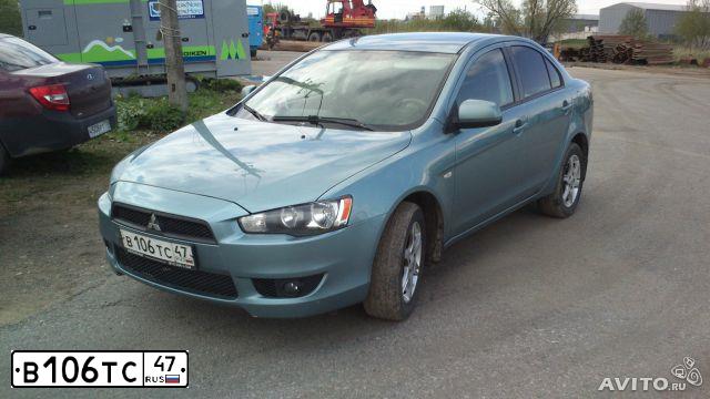 Фото автомобиля MITSUBISHI LANCER, 2007 — госномер А371МК122. Цвет: СВЕТЛО-СЕРО-ЗЕЛЕНЫЙ