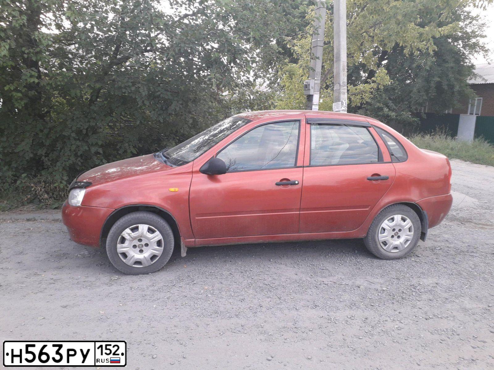 Фото автомобиля LADA 1118 KALINA, 2010 — госномер Е450СН152. Цвет: Красный