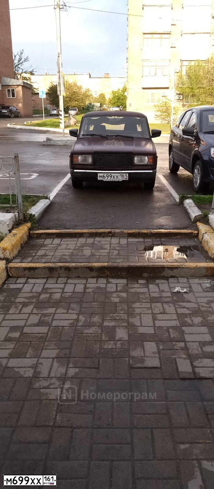 Фото автомобиля LADA 2107, 2006 — госномер М699ХХ161. Цвет: ТЕМНО-ВИШНЕВЫЙ
