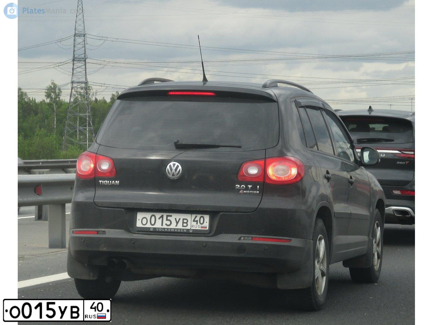 Фото автомобиля VOLKSWAGEN TIGUAN, 2010 — госномер О015УВ40. Цвет: ЧЕРНЫЙ