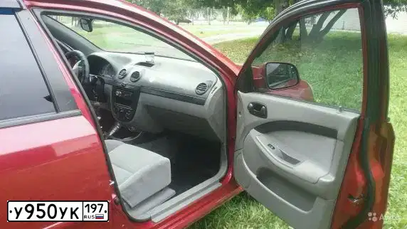 Фото автомобиля CHEVROLET LACETTI, 2012 — госномер М131УЕ159. Цвет: Красный