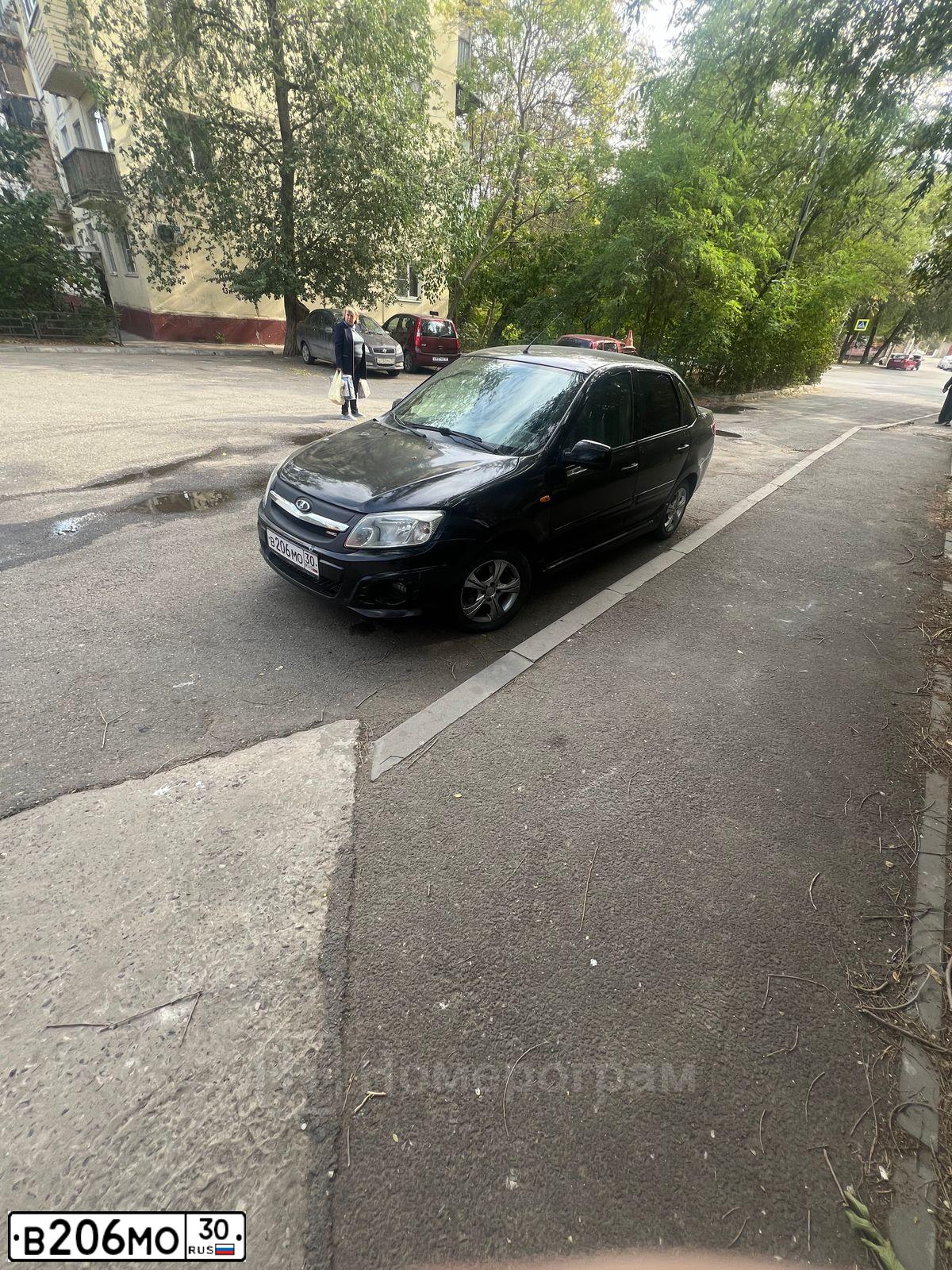 Фото автомобиля LADA 2190 GRANTA, 2012 — госномер В206МО30. Цвет: ЧЕРНЫЙ