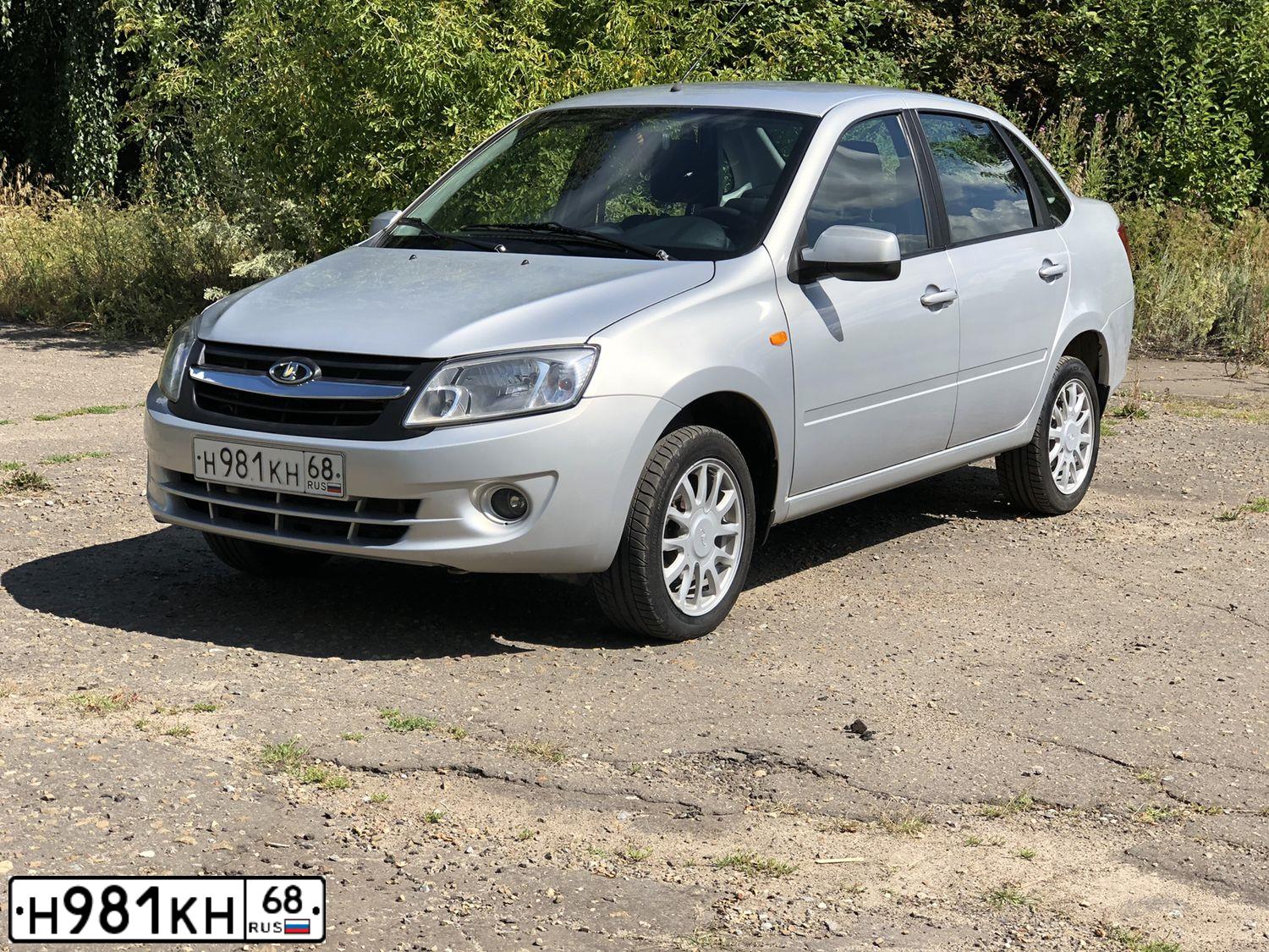Фото автомобиля LADA 2190 GRANTA, 2013 — госномер Н981КН68. Цвет: Серебристый