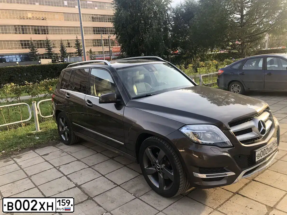 Фото автомобиля VOLKSWAGEN TIGUAN, 2019 — госномер В002ХН159. Цвет: Белый