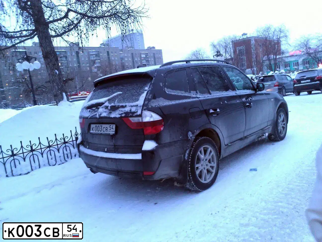 Фото автомобиля MITSUBISHI L 200, 2012 — госномер К003СВ54. Цвет: Белый