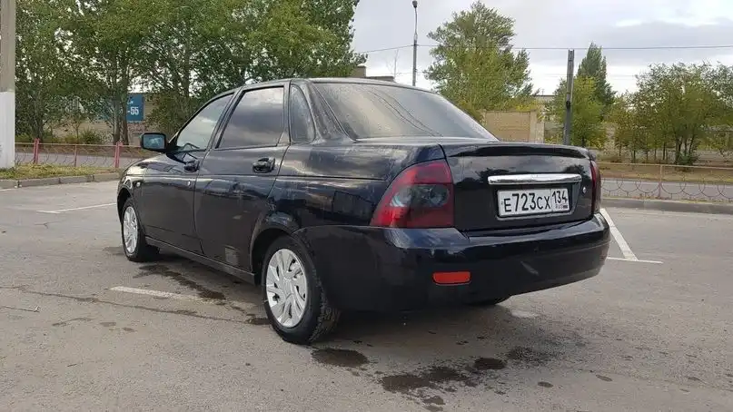 Фото автомобиля LADA 2170 PRIORA, 2010 — госномер М409ОЕ134. Цвет: СИНЕ-ЧЕРНЫЙ