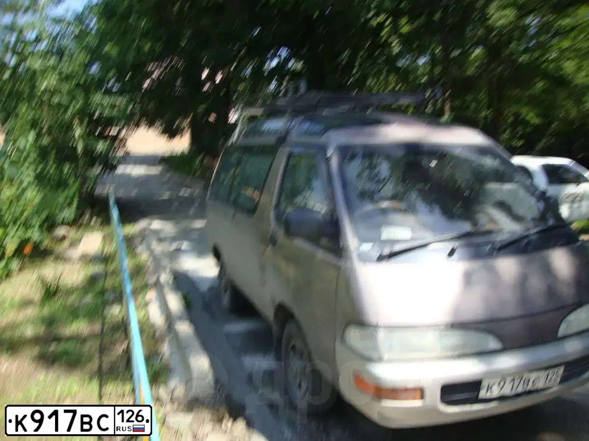 Фото автомобиля GAZ 2752 SOBOL, 1999 — госномер Т949ТТ26. Цвет: ЗЕЛЕНЫЙ