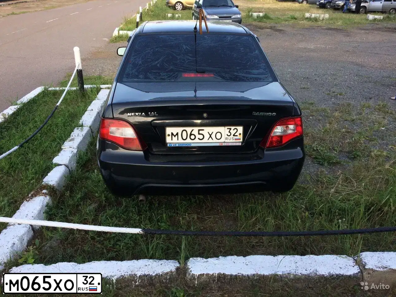 Фото автомобиля DAEWOO NEXIA, 2013 — госномер С236АТ797. Цвет: БЛЕДНО-ЧЕРНЫЙ
