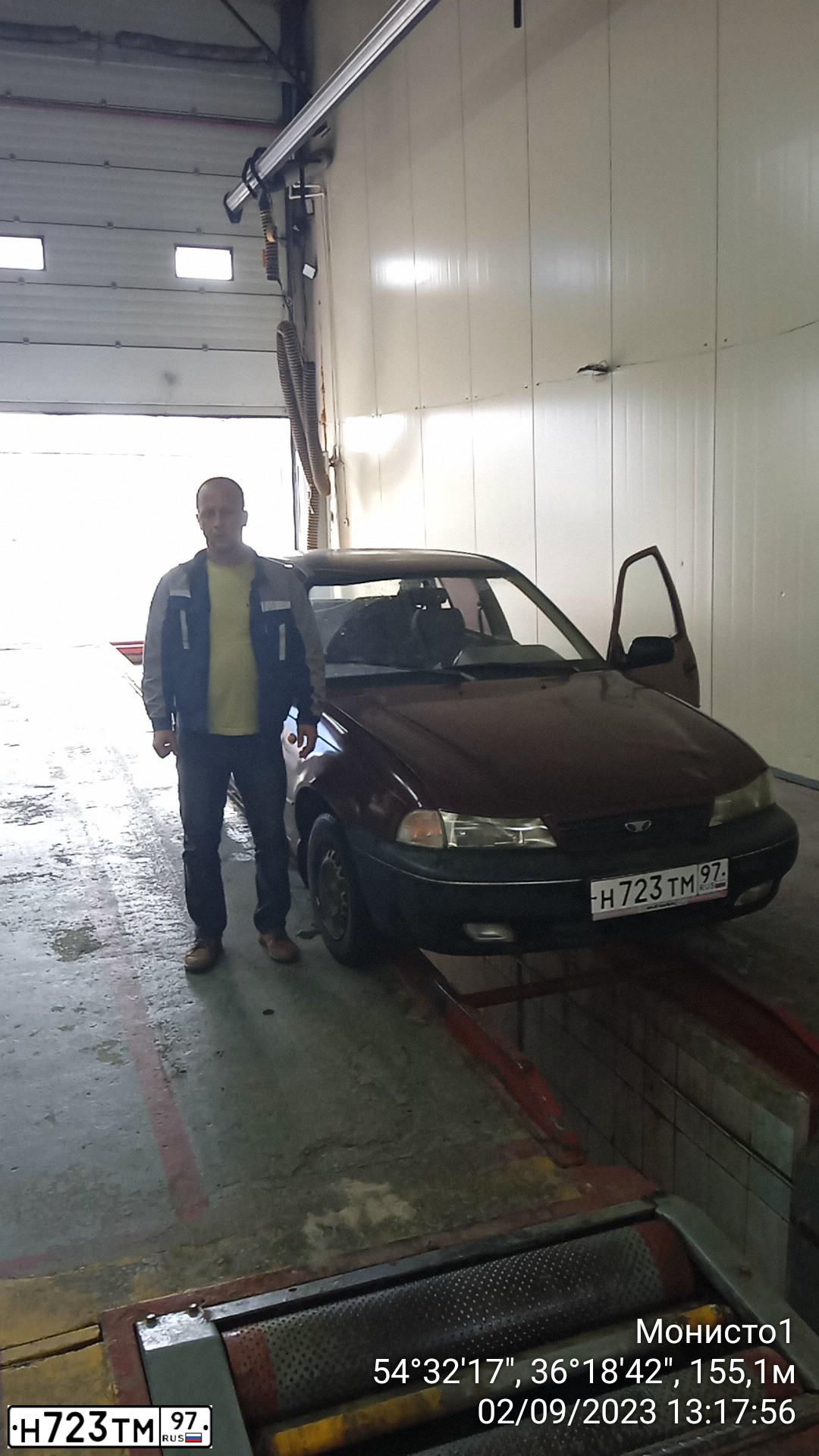 Фото автомобиля DAEWOO NEXIA, 2000 — госномер Р166ХС40. Цвет: ИСПАНСКИЙ КРАСНЫЙ