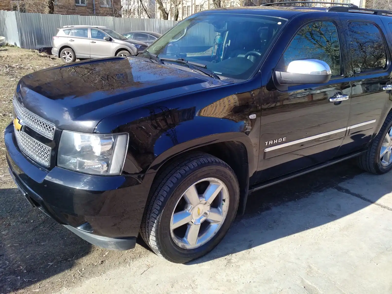 Фото автомобиля CHEVROLET TAHOE, 2012 — госномер Т234СН777. Цвет: Белый