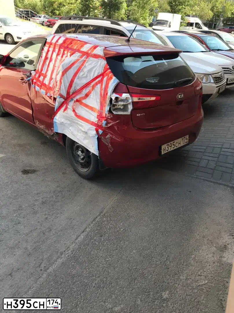Фото автомобиля KIA RIO, 2014 — госномер Н395СН174. Цвет: КРАСНЫЙ