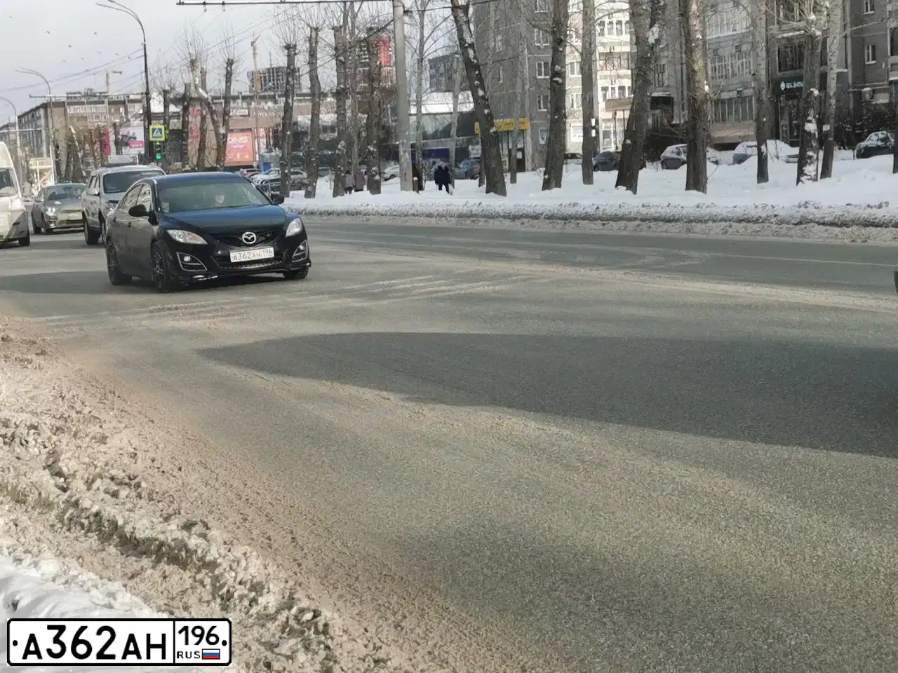 Фото автомобиля MAZDA 6, 2010 — госномер К073УТ702. Цвет: ЧЕРНЫЙ