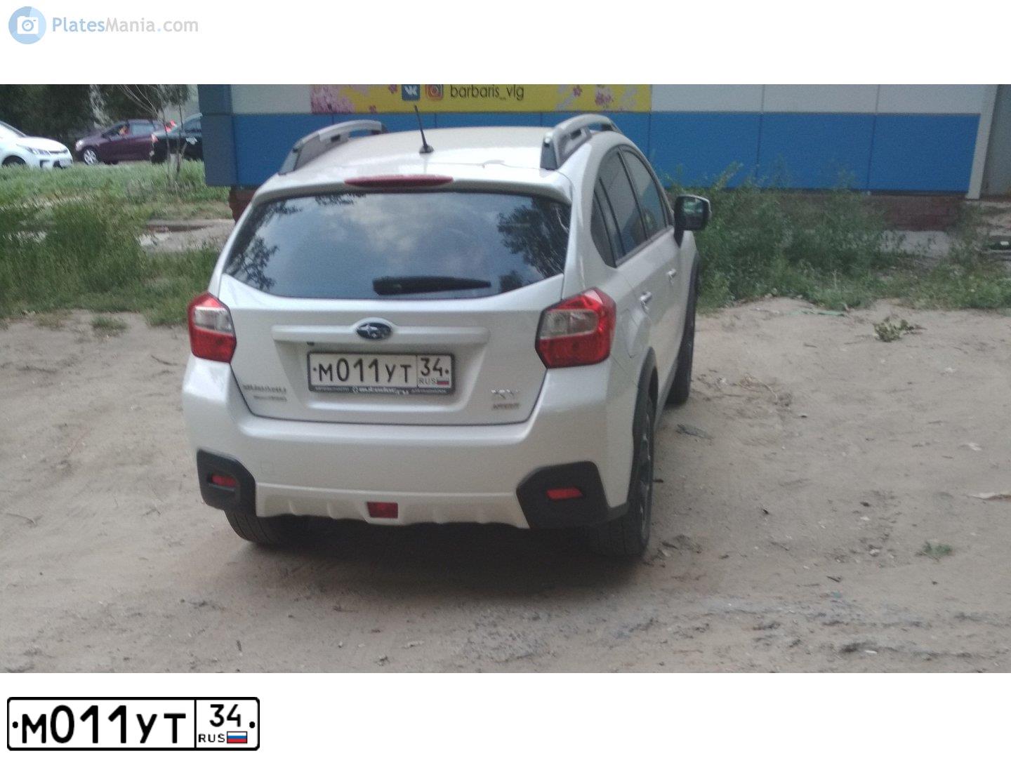 Фото автомобиля TOYOTA YARIS, 2008 — госномер М011УТ34. Цвет: Красный