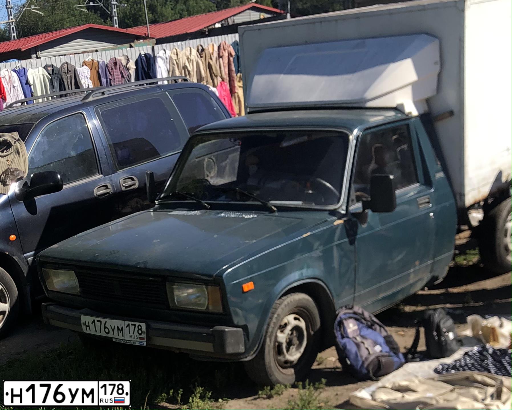 Фото автомобиля LADA 2345 WIS, 2006 — госномер Н176УМ178. Цвет: Сине-зеленый