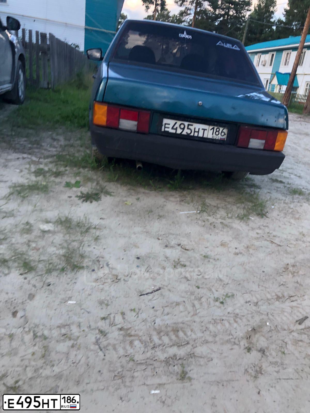Фото автомобиля LADA 2115 SAMARA, 2005 — госномер Е495НТ186. Цвет: СЕРО-ЗЕЛЕНЫЙ