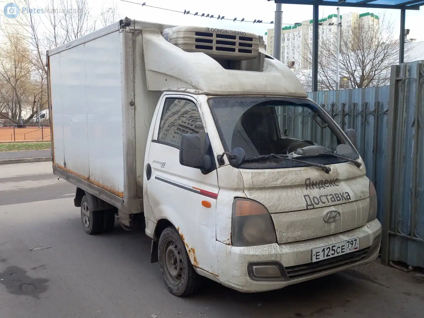 Фото автомобиля HYUNDAI PORTER, 2012 — госномер Е125СЕ797. Цвет: Белый