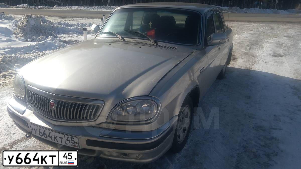Фото автомобиля GAZ 3110 WOLGA, 2007 — госномер М100ЕЕ45. Цвет: БЕЖЕВЫЙ МЕТАЛИК