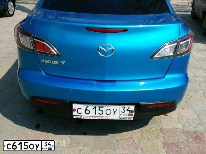 Фото автомобиля MAZDA 3, 2009 — госномер Н462КР134. Цвет: голубой