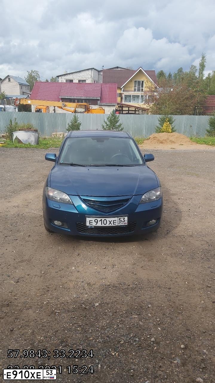 Фото автомобиля MAZDA 3, 2007 — госномер Е910ХЕ53. Цвет: СИНЕ ЗЕЛЕНЫЙ