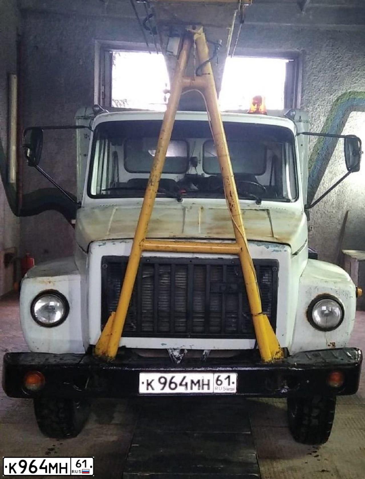 Фото автомобиля GAZ 3307, 1992 — госномер К964МН61. Цвет: БЕЛЫЙ