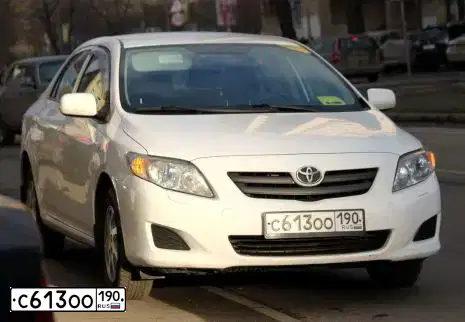 Фото автомобиля TOYOTA COROLLA, 2007 — госномер К471ОХ21. Цвет: Белый