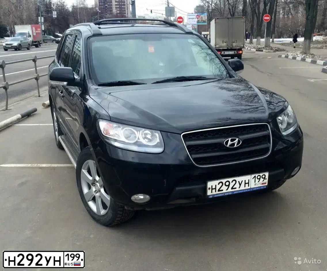 Фото автомобиля HYUNDAI SANTA FE, 2008 — госномер Е573УТ123. Цвет: ЧЕРНЫЙ