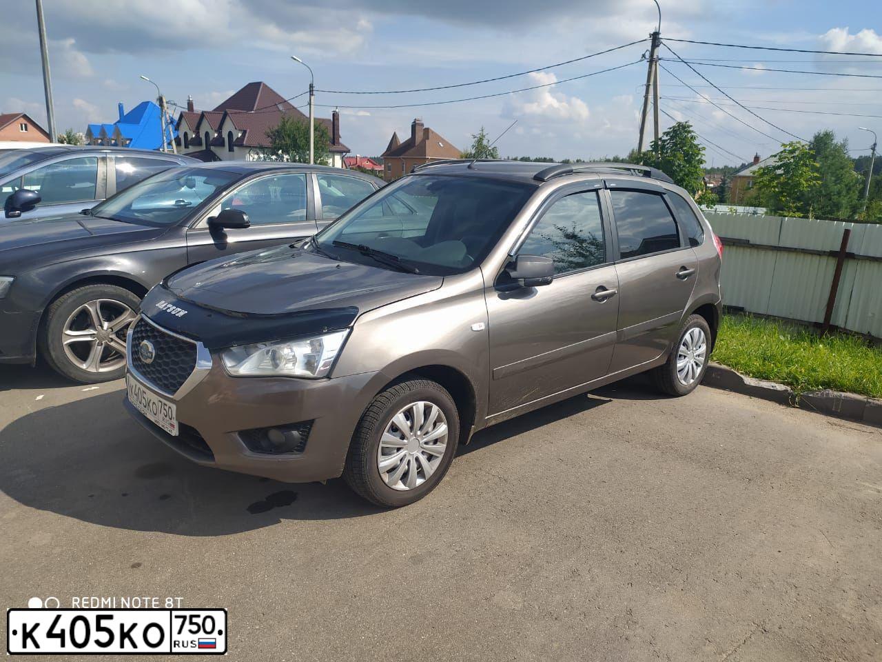 Фото автомобиля DATSUN MI-DO, 2015 — госномер К405КО750. Цвет: СЕРЫЙ