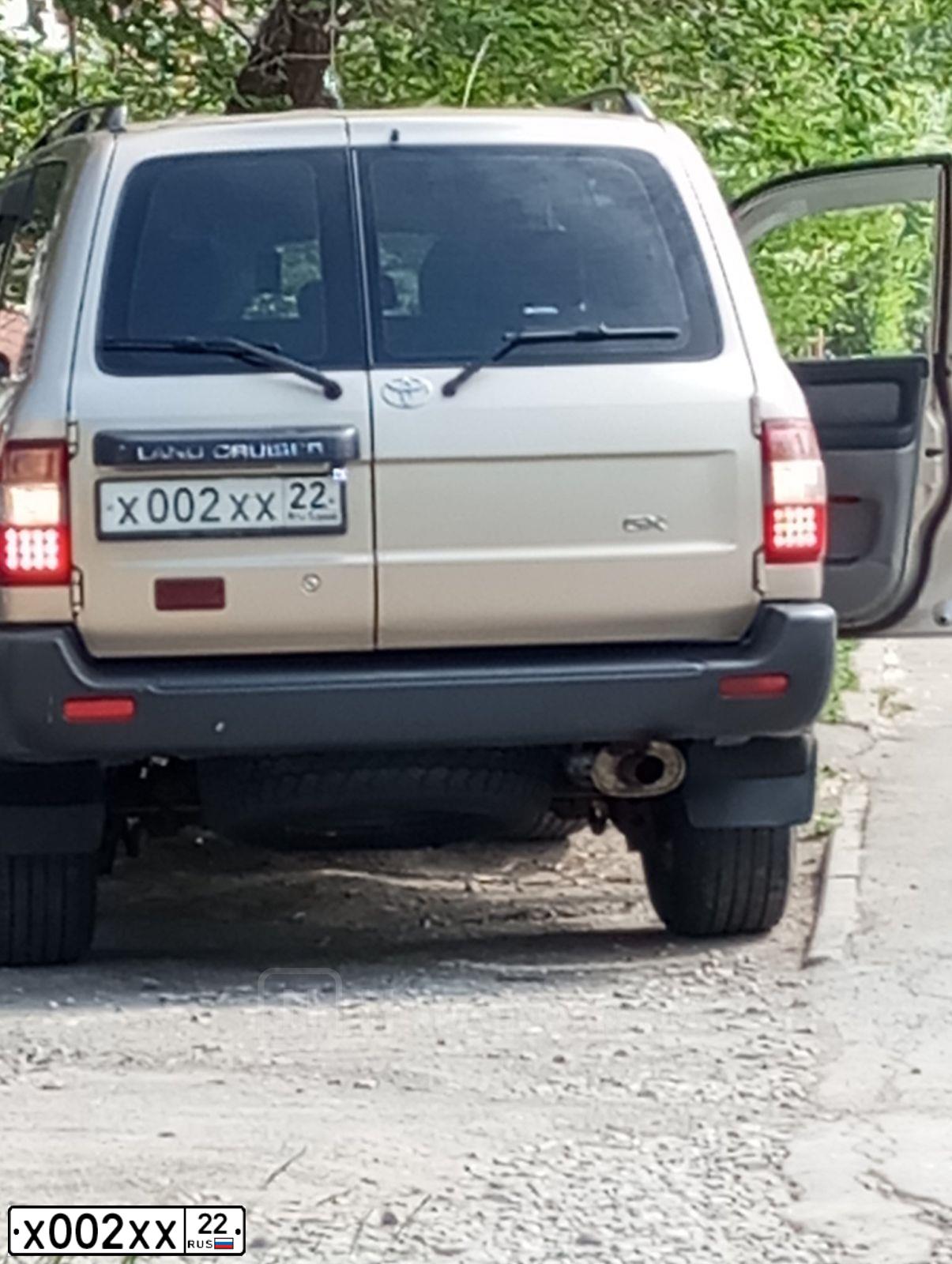 Фото автомобиля TOYOTA LANDCRUISER, 2006 — госномер Х002ХХ22. Цвет: ЗОЛОТИСТЫЙ