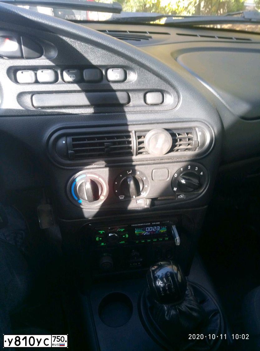 Фото автомобиля CHEVROLET NIVA, 2009 — госномер Р128РР52. Цвет: Светло-Серебристый металлик