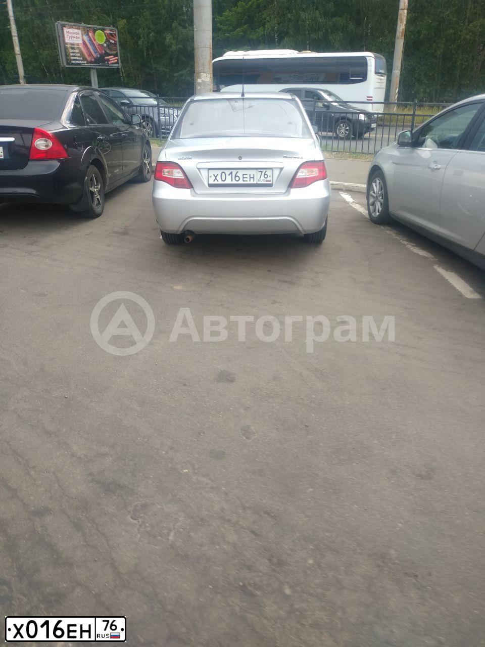 Фото автомобиля DAEWOO NEXIA, 2012 — госномер Х016ЕН76. Цвет: СВЕТЛО-СЕРЫЙ