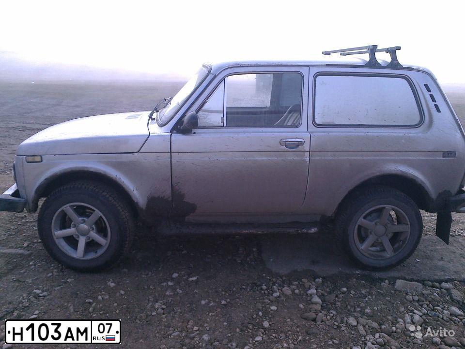 Фото автомобиля LADA 2121 NIVA, 1990 — госномер Н103АМ07. Цвет: СВЕТЛО-СЕРЫЙ