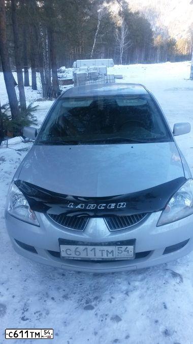 Фото автомобиля MITSUBISHI LANCER, 2005 — госномер А264ЕХ122. Цвет: Серебристый