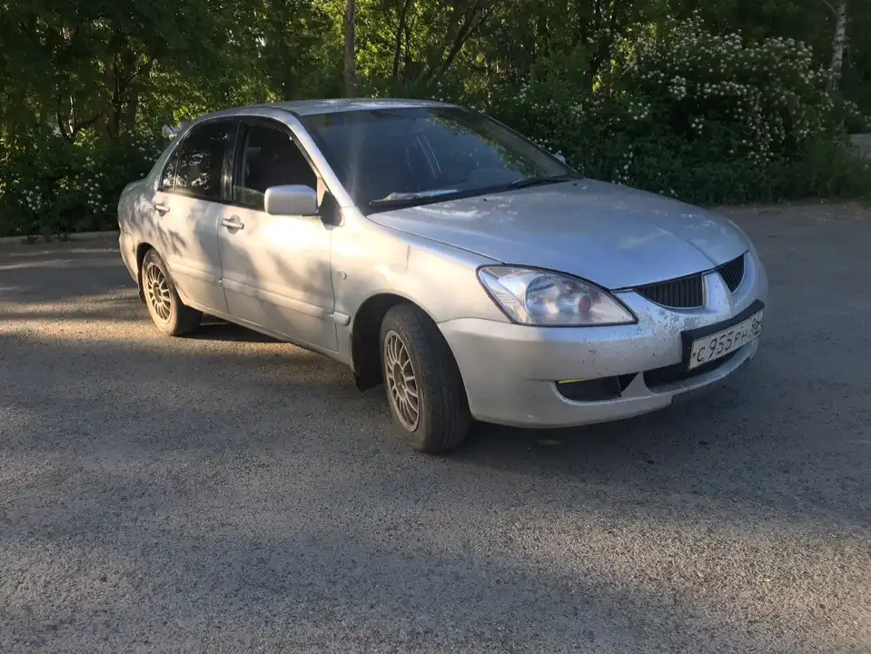 Фото автомобиля TOYOTA COROLLA, 2006 — госномер А449НТ89. Цвет: голубой