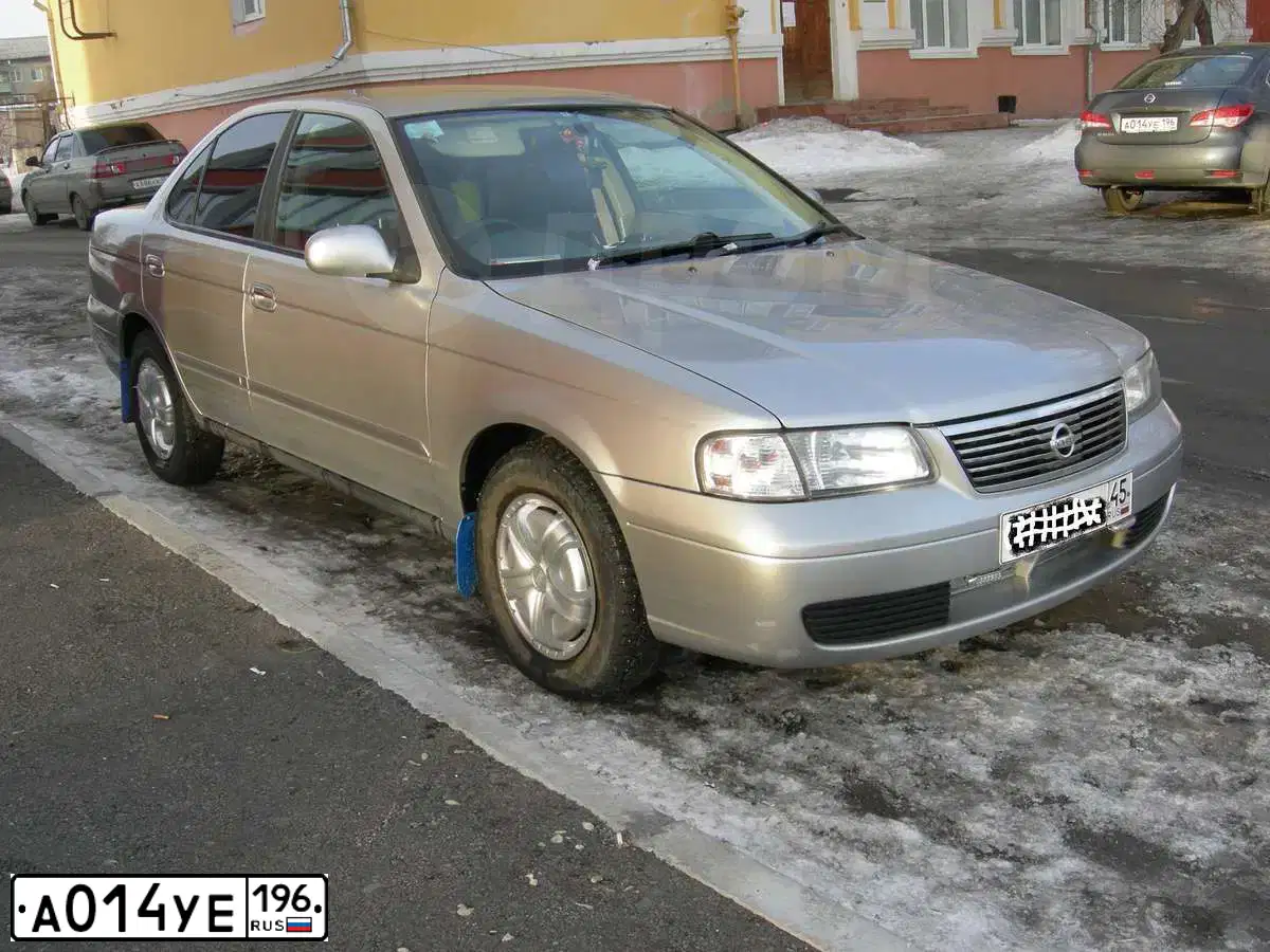 Фото автомобиля NISSAN ALMERA /AVTOVAZ/, 2013 — госномер Т843ОА72. Цвет: СЕРО СИНИЙ