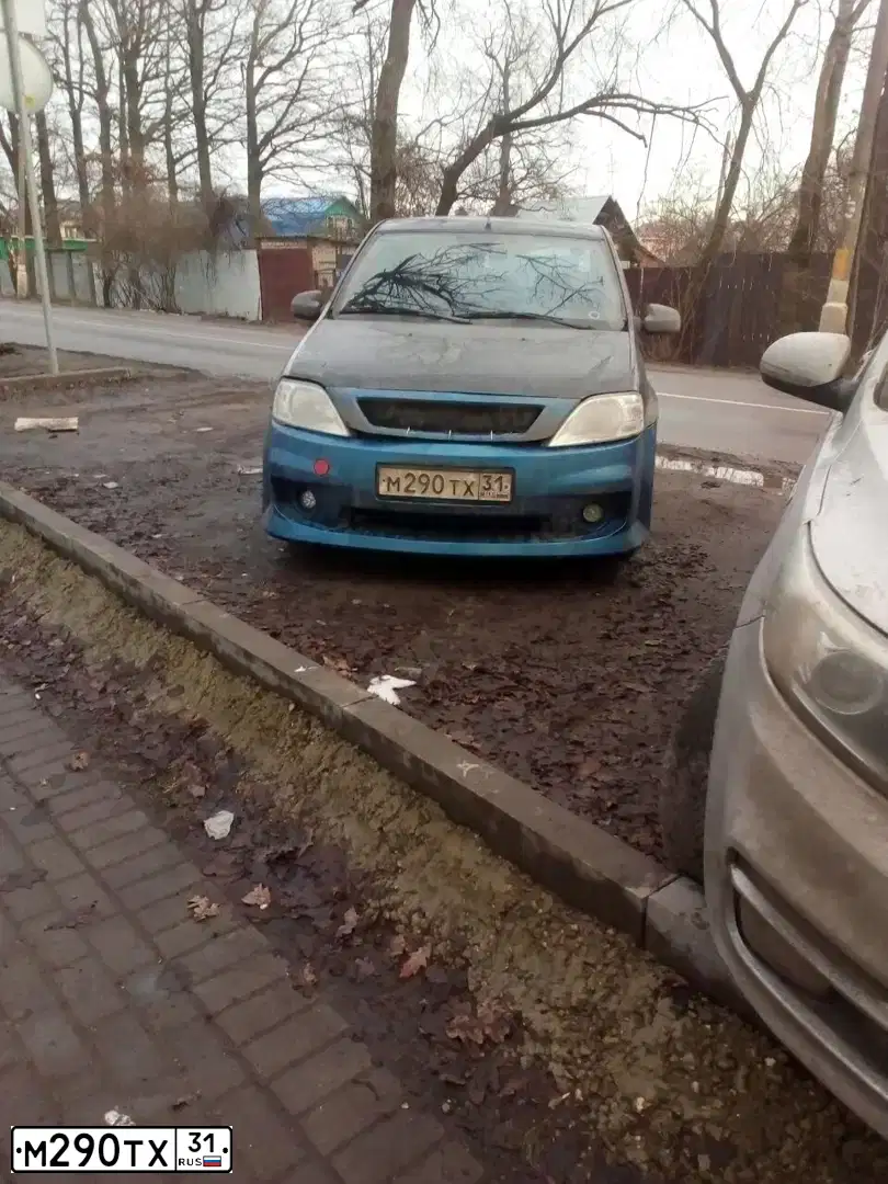 Фото автомобиля RENAULT LOGAN, 2010 — госномер М539ХК35. Цвет: ЧЕРНЫЙ