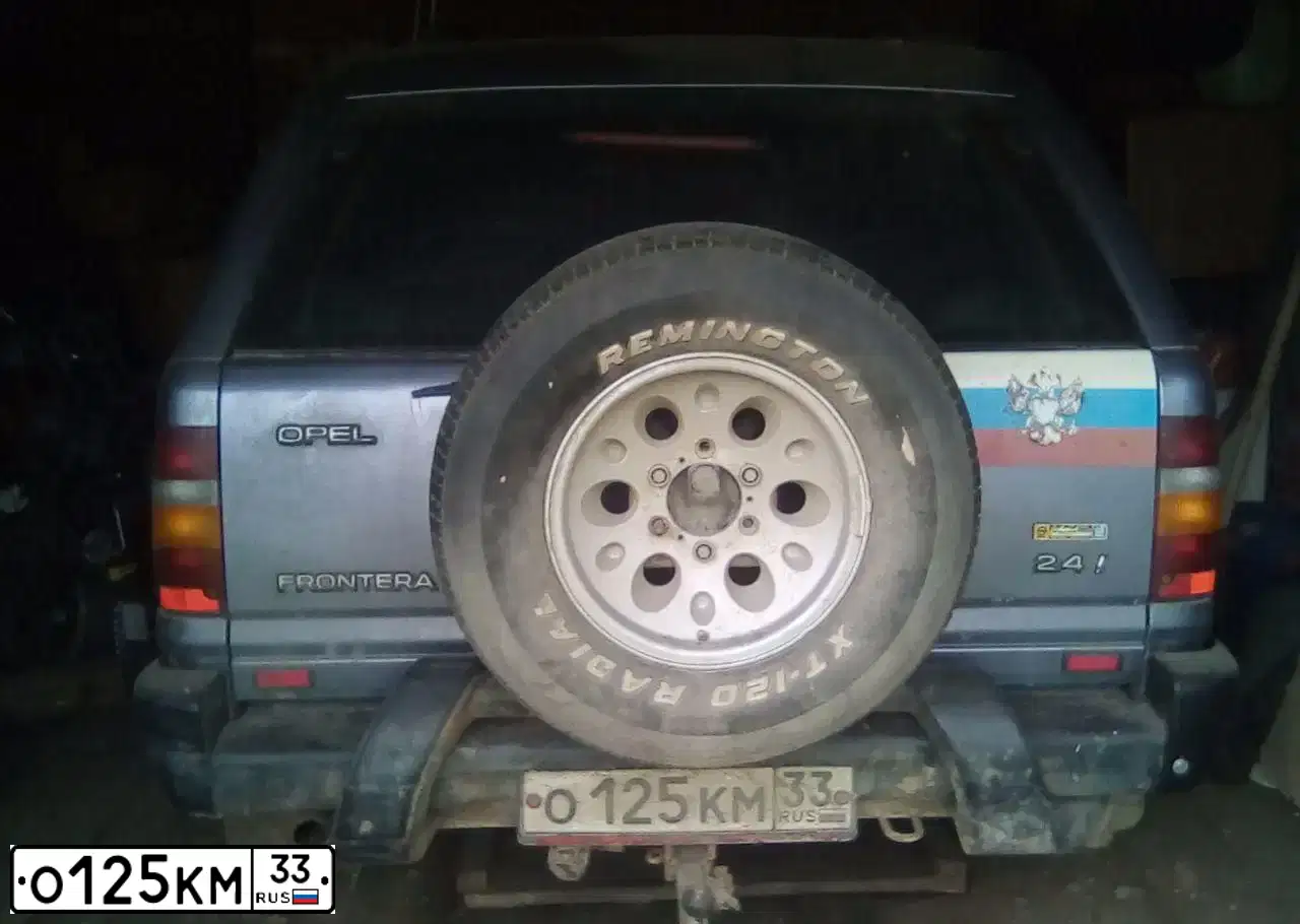 Фото автомобиля OPEL FRONTERA, 1994 — госномер О125КМ33. Цвет: синий