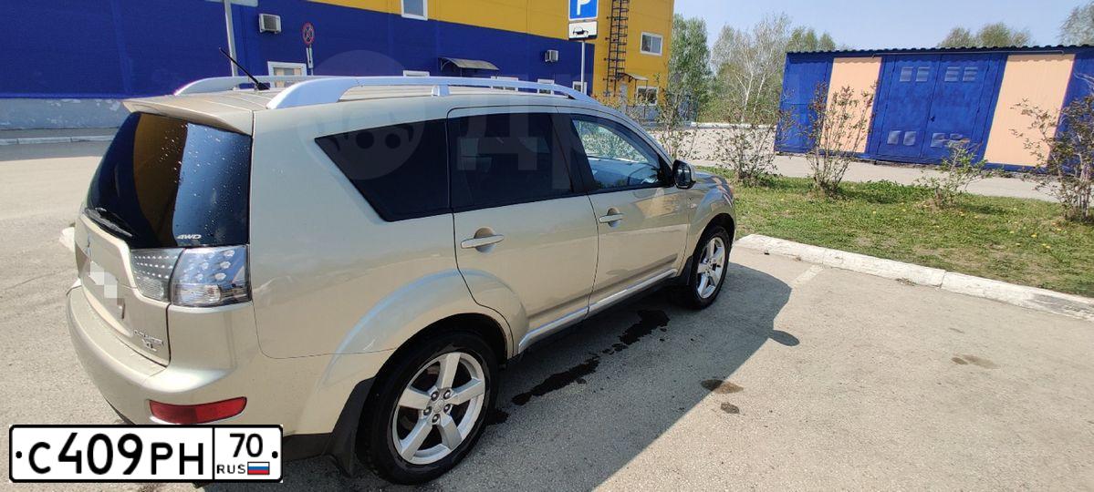 Фото автомобиля MITSUBISHI OUTLANDER, 2008 — госномер Т686МК71. Цвет: БЕЖЕВЫЙ