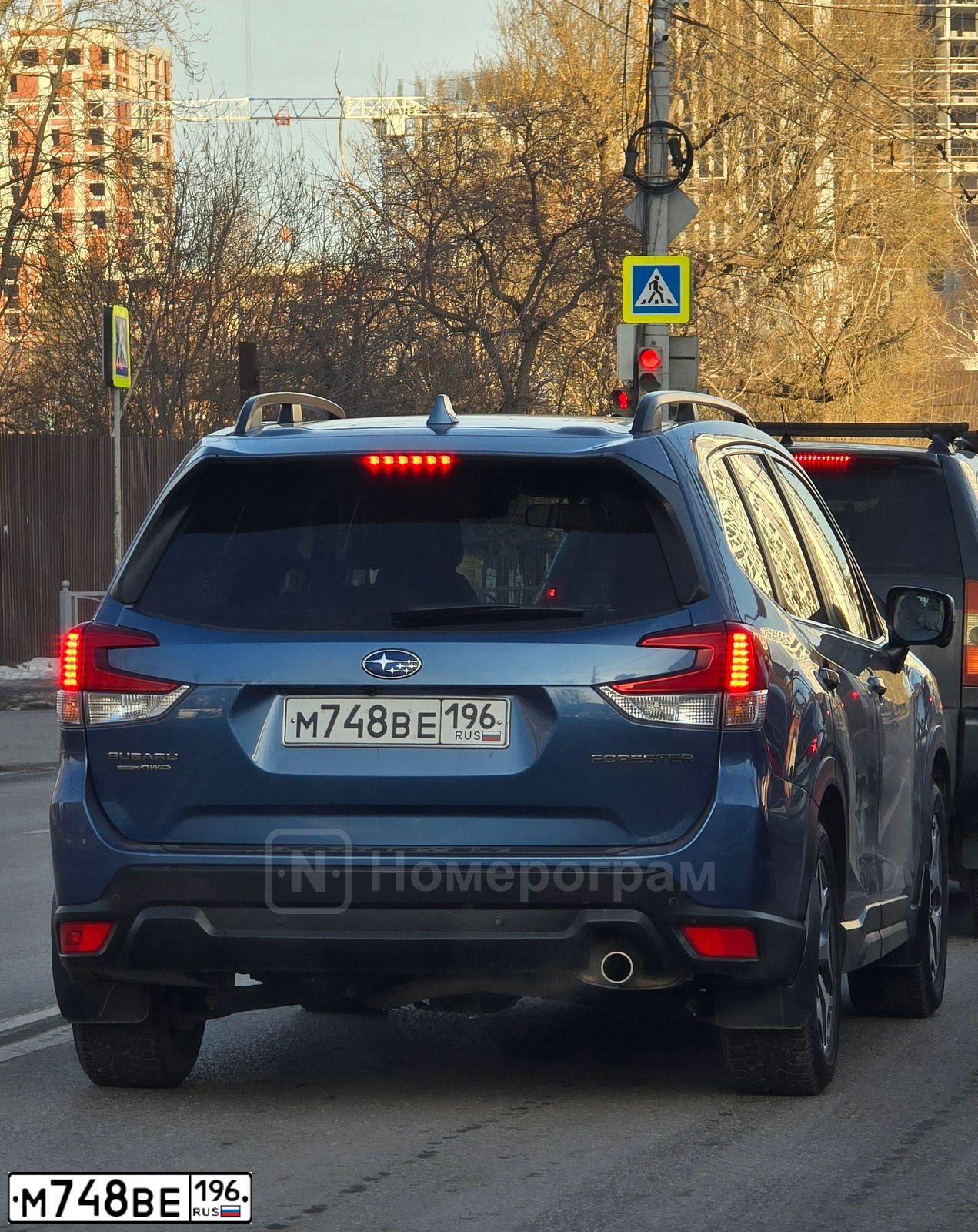 Фото автомобиля SUBARU FORESTER, 2019 — госномер М748ВЕ196. Цвет: СИНИЙ