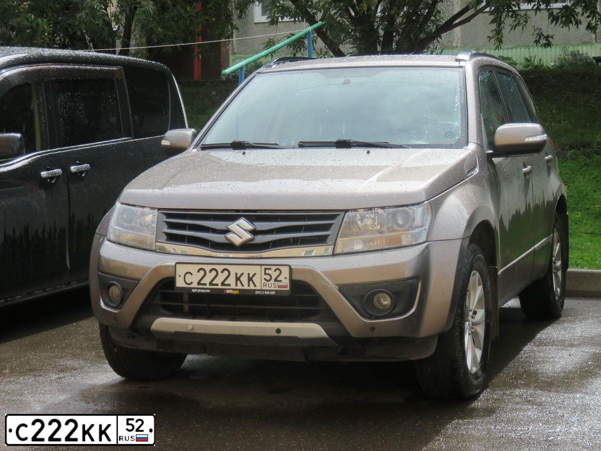 Фото автомобиля SUZUKI GRAND VITARA, 2014 — госномер Т469РТ124. Цвет: бронзовый